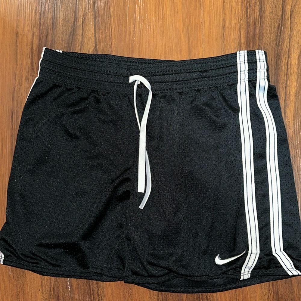 Black with white strip nike shorts. XS, barely worn.